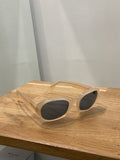 Emmanuelle Khanh | shiny yellow sunglasses with blue lenses