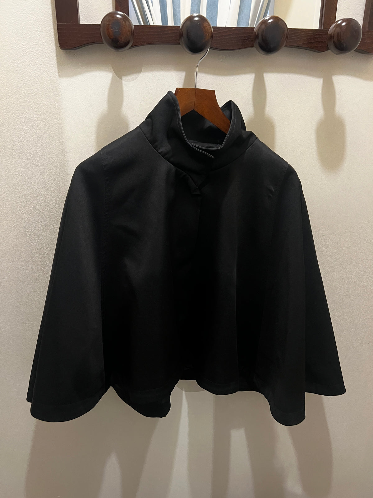 Unknown | Black cape